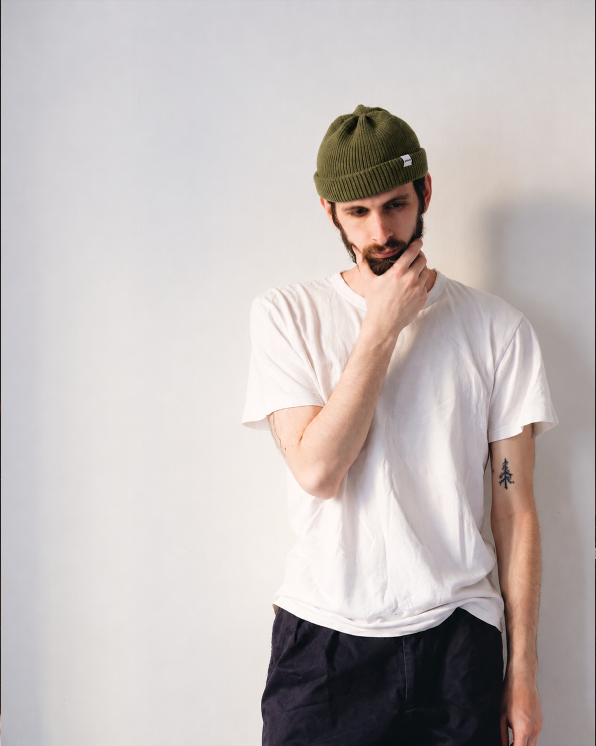 Druthers merino wool Dockworker hat in olive, on model, alternate view